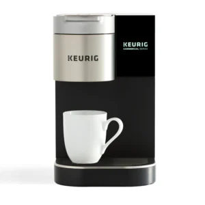 Standalone front shot Keurig coffee brewer Quench 171 with mug and white background