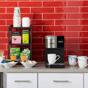 Front shot lifestyle image of Quench 171 coffee brewer on countertop with coffee break room supplies