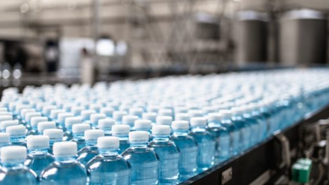 https://quenchwater.com/wp-content/uploads/2022/11/plastic-water-bottles-in-a-factory-min-1280x720.jpg