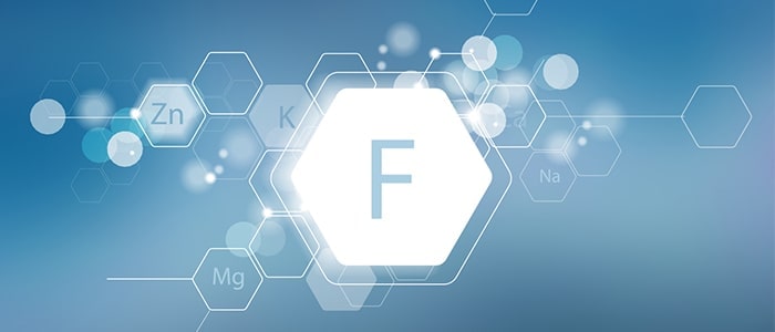 Capital letter F in a white hexagon